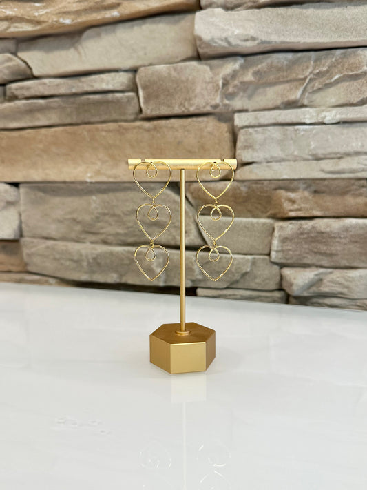 Boucles d'oreilles avec des coeurs dorées en acier inoxydable