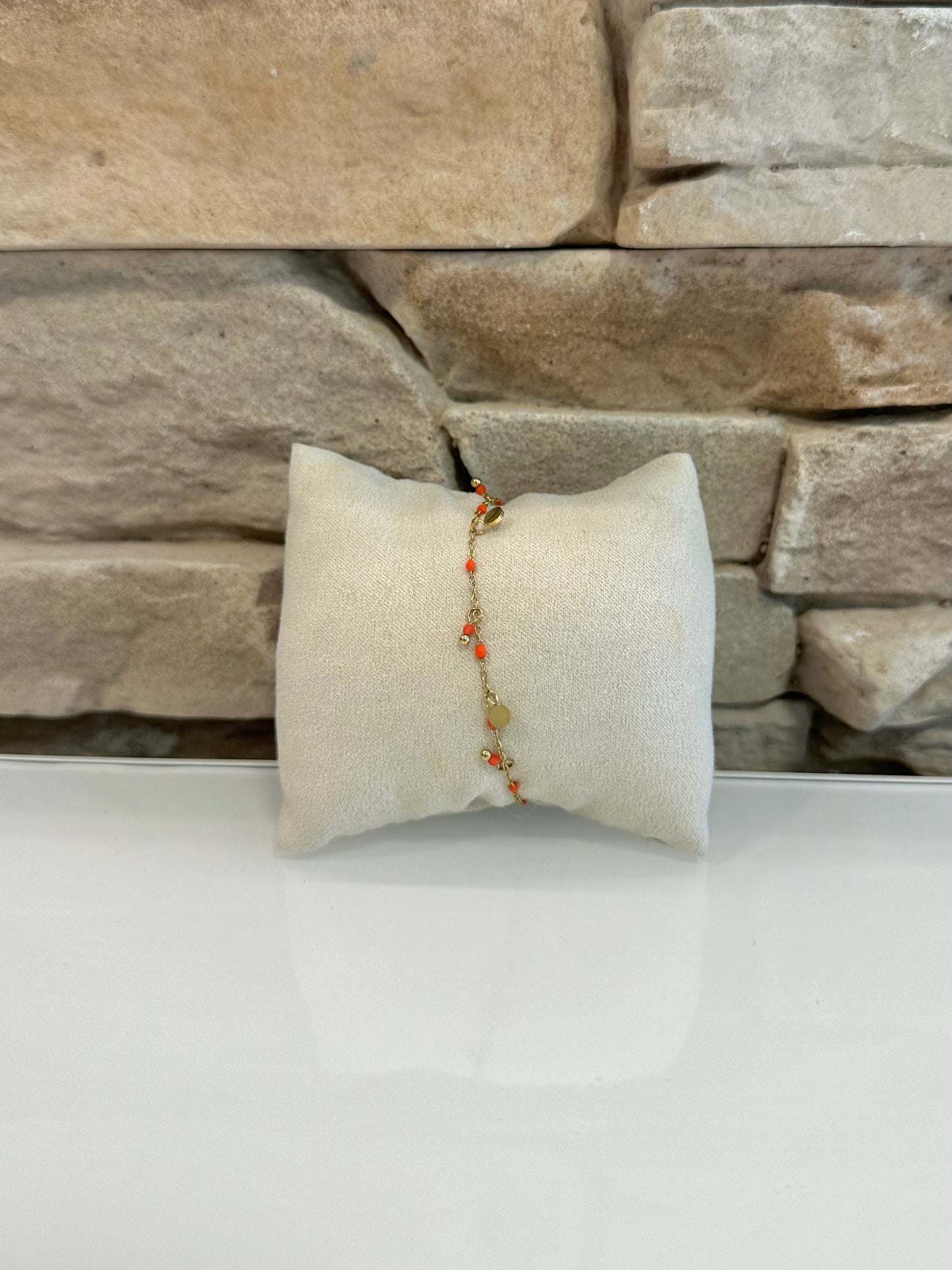 Bracelet doré en acier inoxydable tons corail & rouge orangé